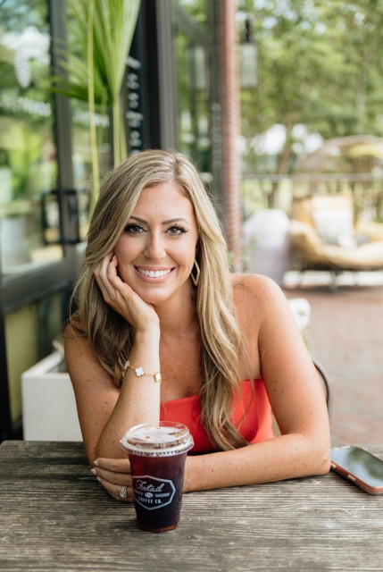 Dallas Wittish smiling for a professional real estate portrait